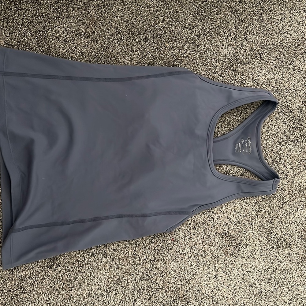 Gray Calvin Klein shirt has a bra inside